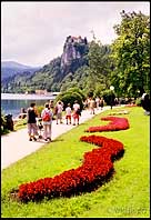 People take a stroll around lake bled, Slovenia