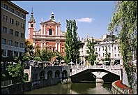 ljubljanica river with the franciscan church in the distance, Ljubljana